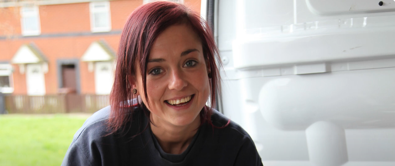 Sasha smiling at the camera 