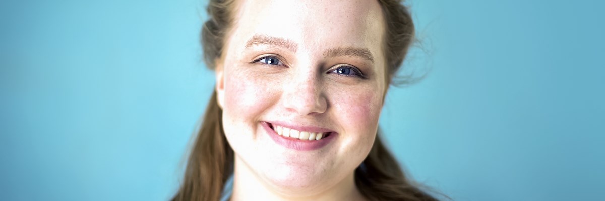 Hannah smiling at the camera 