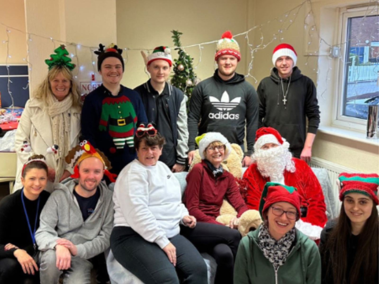 Group Project search interns all smiling with Christmas hats on